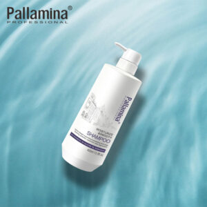 Pallamina moisturize and smooth shampoo pump bottle on wavy blue fabric.